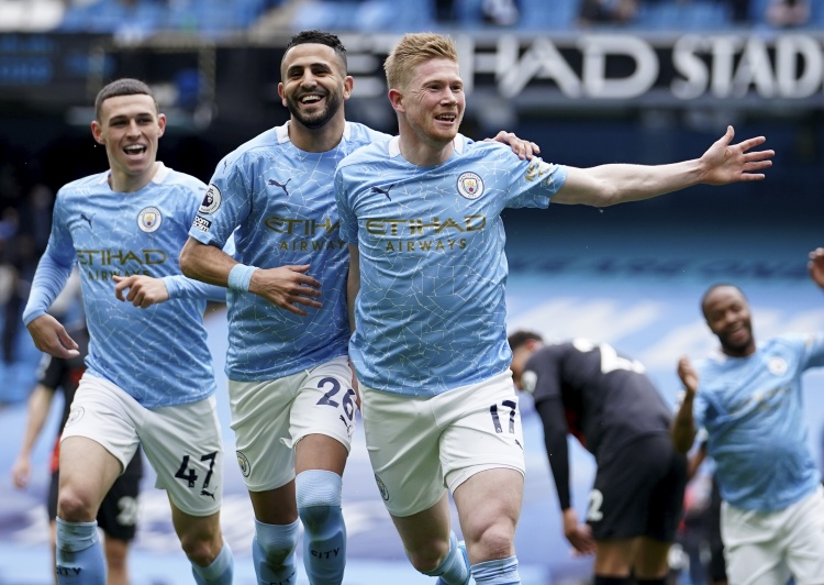 何宇鹏：在国安踢球真的很幸福；法比奥实至名归的金靴太帅啦（何宇鹏：为国安效力倍感幸福，法比奥金靴名副其实又帅气）